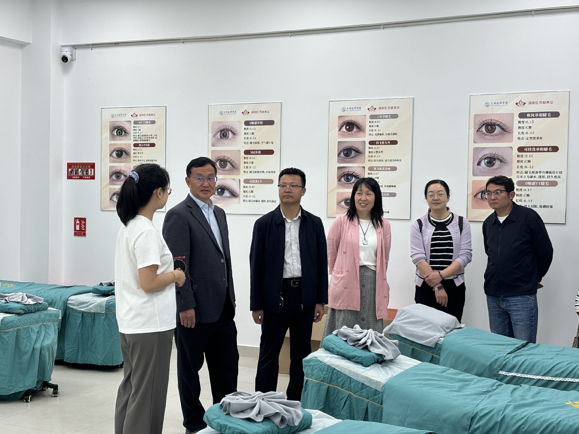 校际交流促提升，携手共进谱新篇